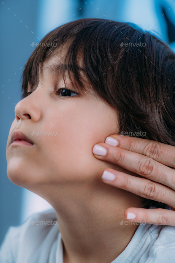 Pediatrician Endocrinologist Examining Lymph Nodes of a Preschooler Boy